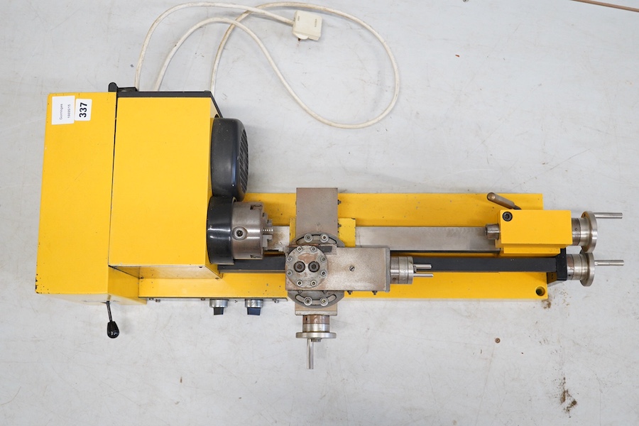 A Hobbymat Universal precision lathe, type MD65, length 79cm. Condition - fair to good.